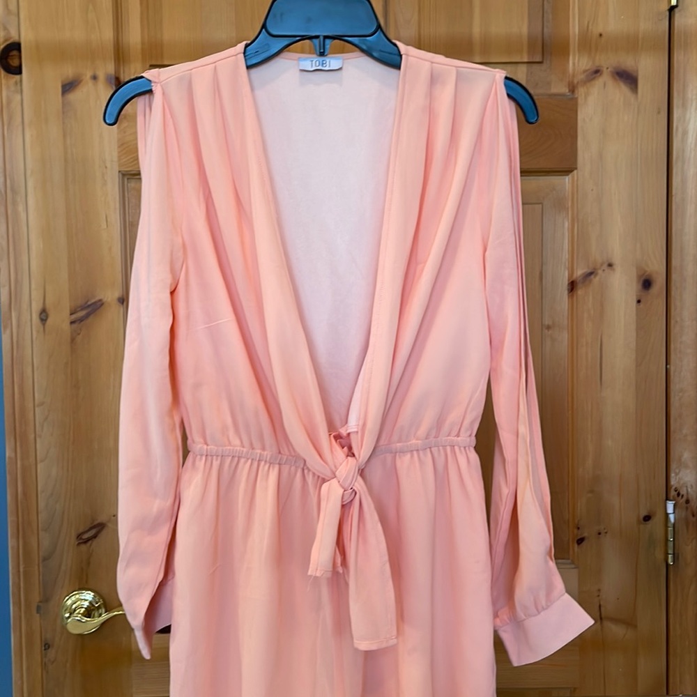 Peach Romper with cut out shoulder sleeves!